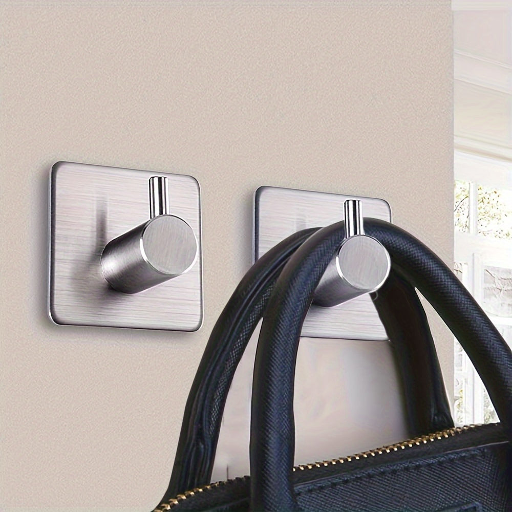 Four-Pack Stainless Steel Wall Hooks for Bathroom and Bedroom Organization Durable Polished Finish