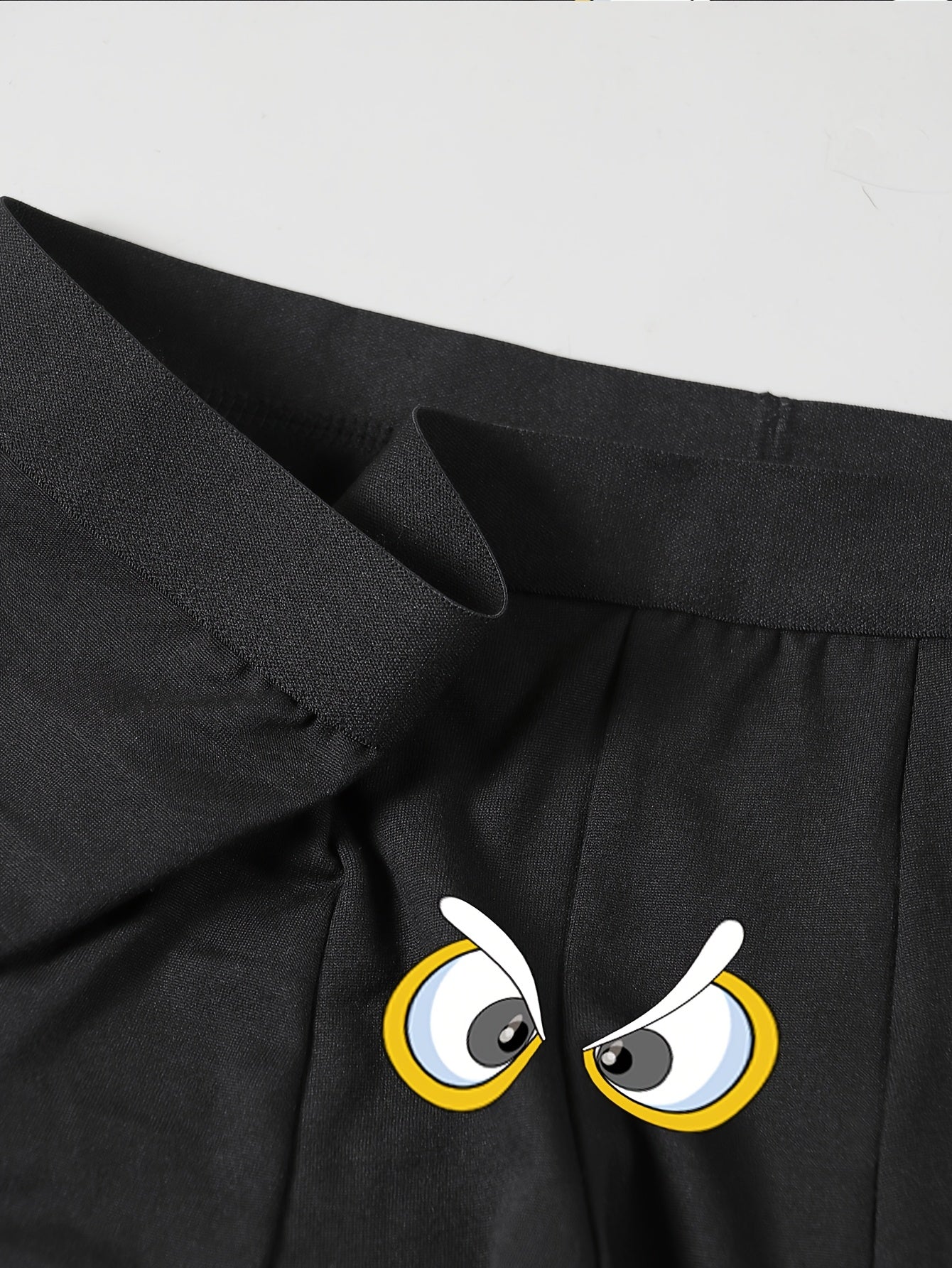 Erkaklar uchun o'yinchoq karikatura ko'z printli boxer shortlari - qora rangdagi elastik belbog' bilan cho'ziluvchan, nafas oladigan va qulay to'qilgan mato.