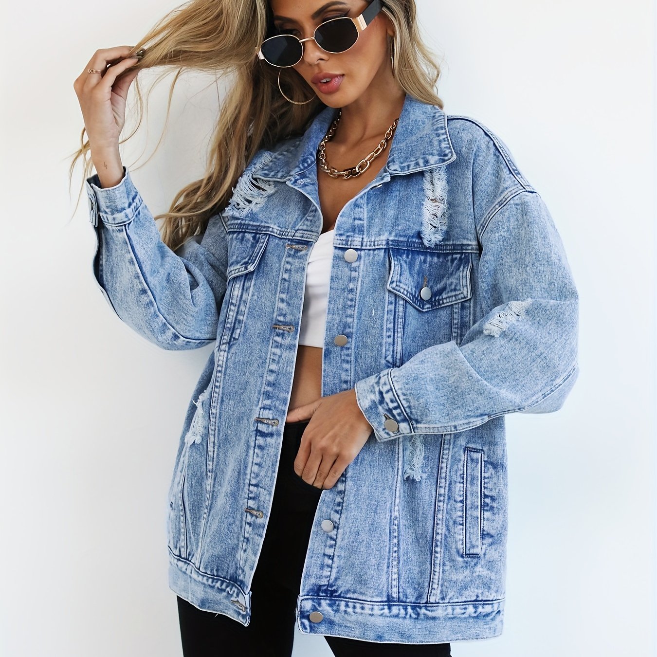 Women’s Light Blue Denim Jacket with Ripped Detailing and Long Sleeves