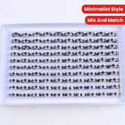 Ushbu minimalistik uslubdagi uzuklar to'plami zanglamaydigan po'latdan tayyorlangan bo'lib, 10 dan 20 ta gacha bo'lakni o'z ichiga oladi. Kundalik kiyimlar yoki kechki partiyalarga mos keladigan bu uzuklar erkaklar va ayollar uchun mos keladi.