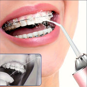 Rechargeable Pink Electric Water Flosser with High-Pressure Jet Tips for Braces and Hard-to-Reach Areas