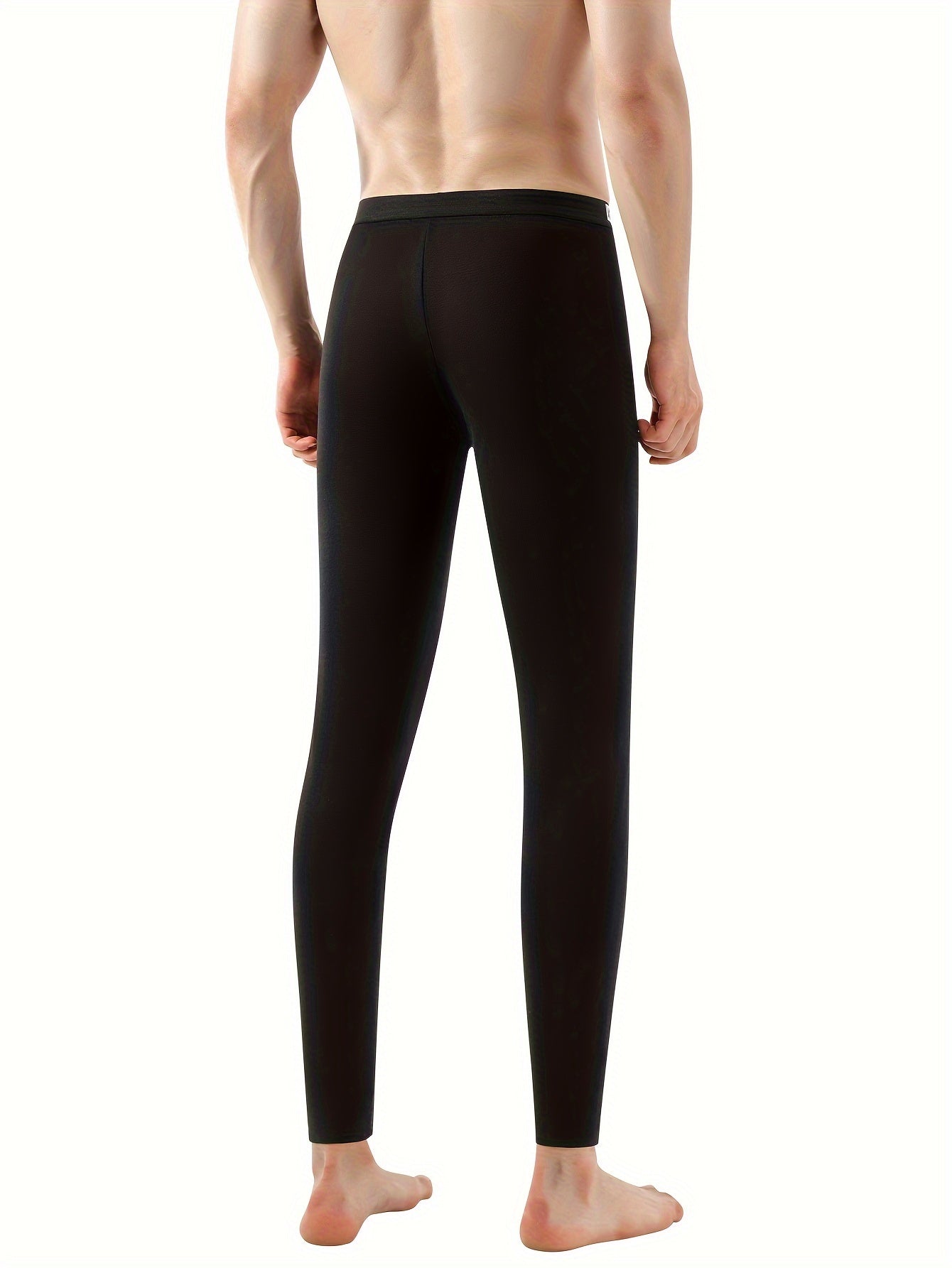 Erkaklar uchun yupqa terma shimlar, iliq flis bilan qoplangan legging uslubida, cho'ziluvchan polyester/spandex aralashmasidan tayyorlangan, kulrang rangda. Qishki qulaylik va norasmiy kiyim uchun mukammal.