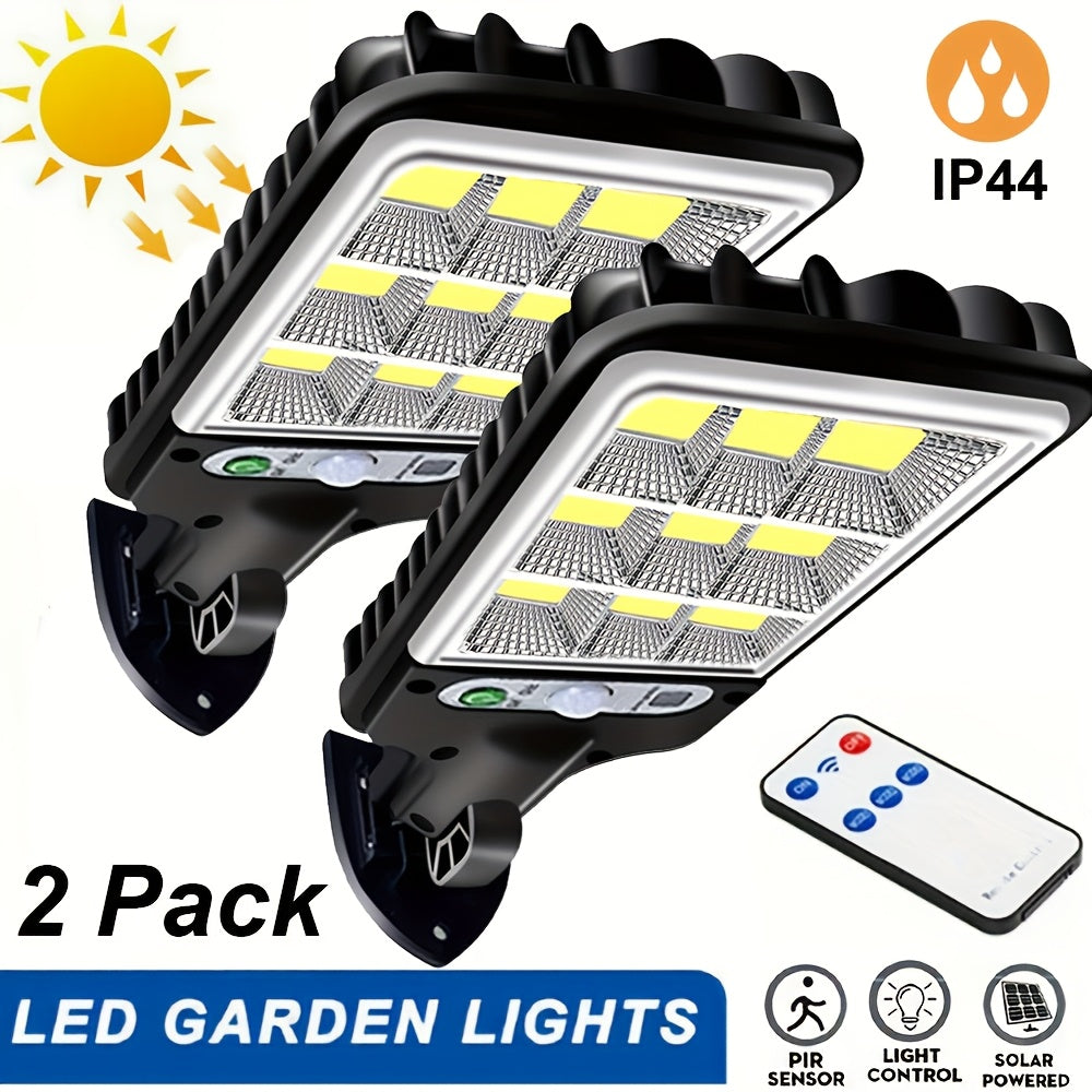 Juego de dos luces solares con sensor de movimiento y control para jardín, patio y seguridad