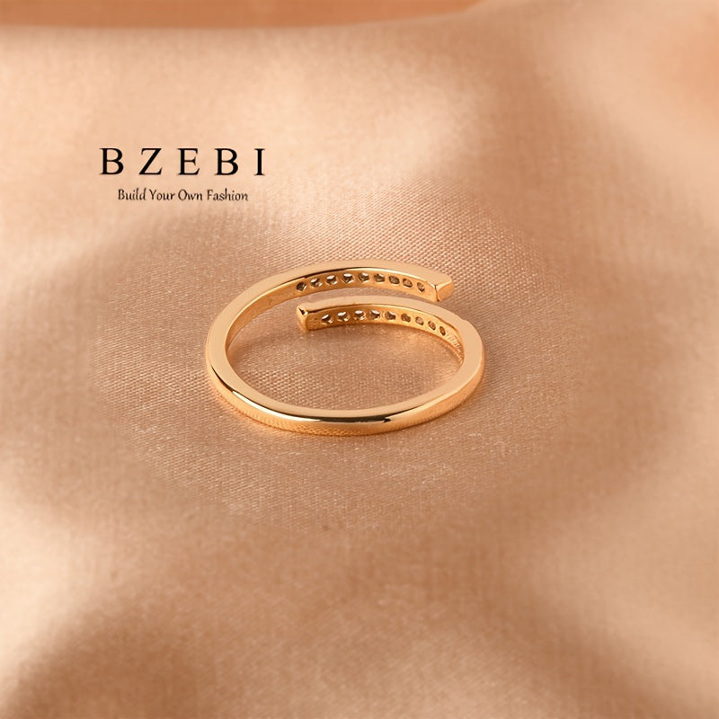 Anillo cruzado ajustable con circonia cúbica en oro de 18K para piel sensible