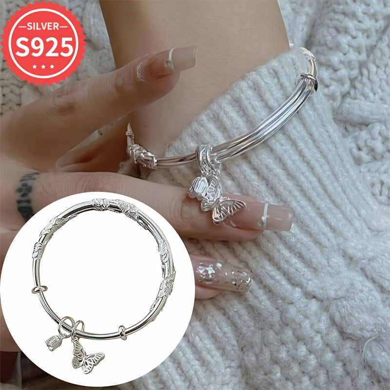 Pulsera ajustable de plata de ley con colgante de flor y mariposa joyería