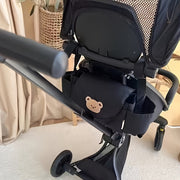 Organizador universal para cochecito de bebé con almacenamiento para biberón y diseño colgante