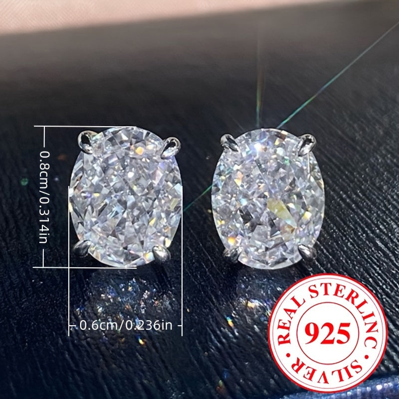 Ushbu zamonaviy kumush sirgalar zirconia aksentlari bilan 2.2 gramm og'irlikda, 925 sterling kumushdan tayyorlangan va kelinlar uchun to'y, niqoh, banket yoki har kuni kiyish uchun mukammaldir.