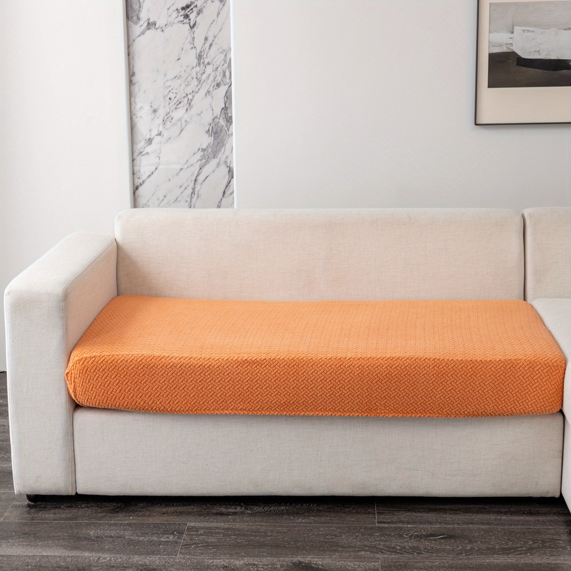 Современный серый чехол для подушки дивана с эластичной посадкой и мягкой текстурированной тканью. Машинная стирка для повышения комфорта в гостиной.