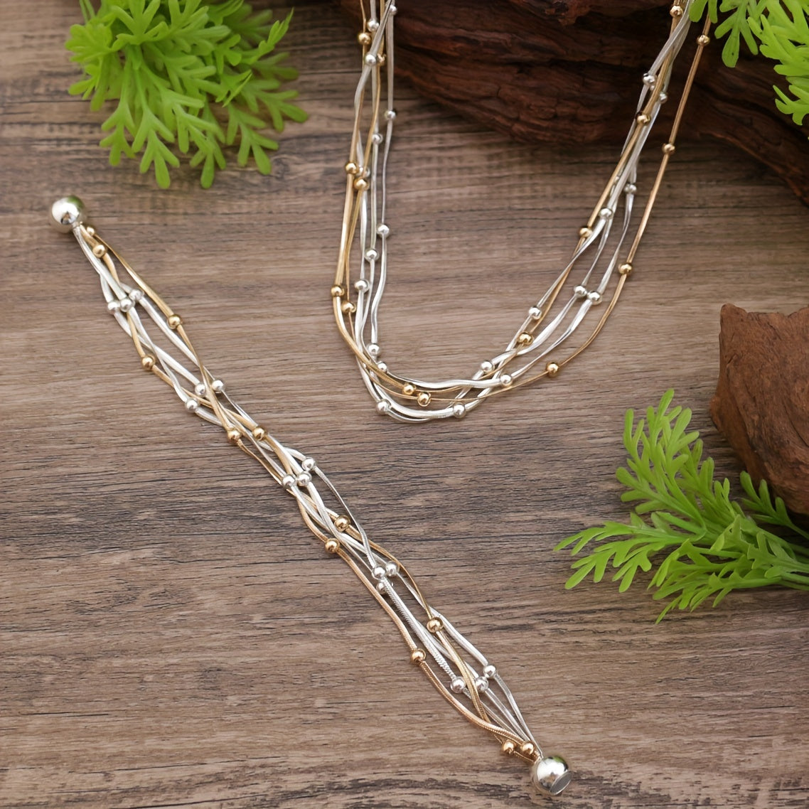 KAMILLE Vintage Punk uslubidagi misdan yasalgan qatlamli ilon zanjirli bilaguzuk va marjon to'plami, magnit qopqoq bilan, partiya va kundalik kiyim uchun uniseks zargarlik, Mardi Gras kuni aksessuar. Nikelga chidamli quloq to'pi va sovg'a uchun tayyor.