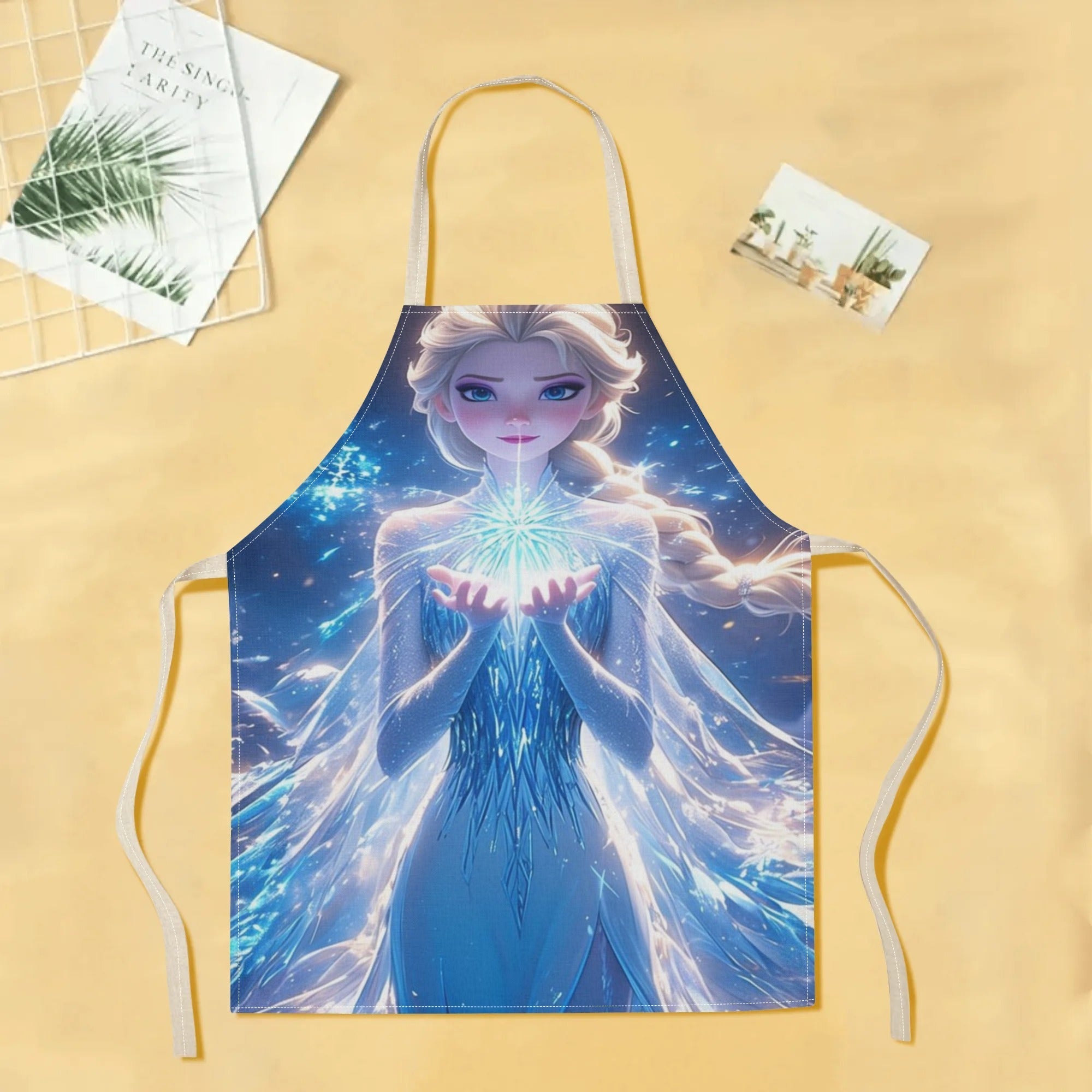Disney rasmiy ravishda Princess Elsa ning adorable multfilm tasviri bilan bezatilgan zamonaviy suv o'tkazmaydigan apronni litsenziyaladi. Bu apron nafaqat chiroyli va zamonaviy, balki oddiy bo'lib, mehmonxonalar kabi turli muhitlar uchun mukammal.