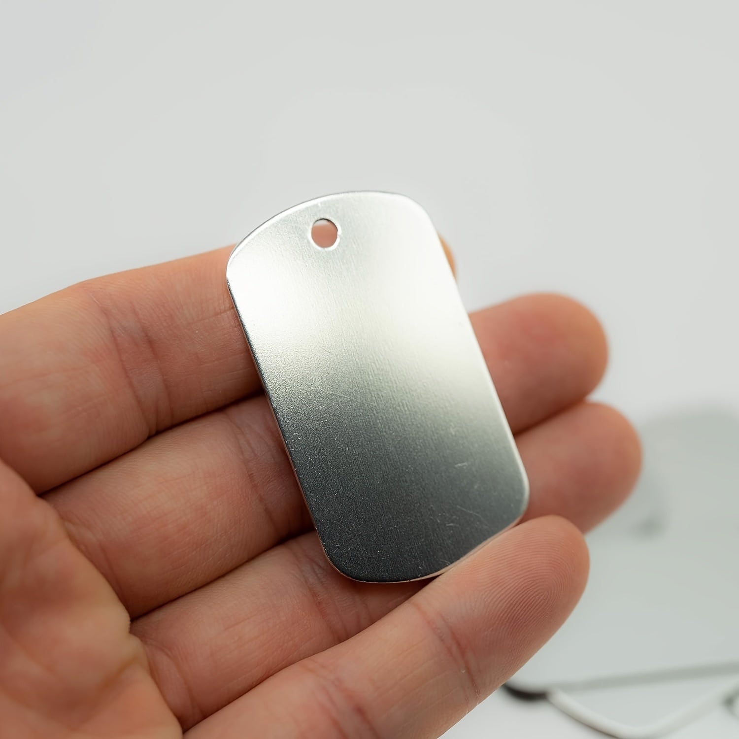 Набор из 25 серебристых алюминиевых заготовок для штамповки - стильный и современный аксессуар для мужчин