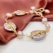Women’s Vintage Style Bracelet with Freshwater Pearls and Hand Chain Design