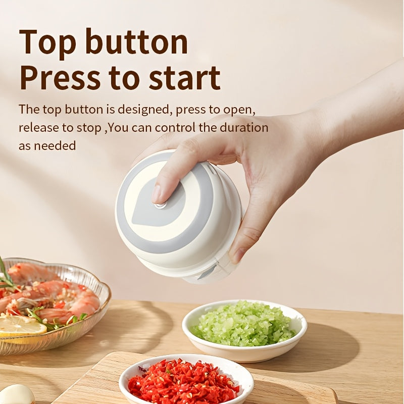 USB orqali zaryadlanadigan mini simsiz elektr sarimsoq maydalagich. Bir bosish bilan ishlash, 1000 RPM motor va oson tozalash dizayni. Uy oshxonasida, lagerda va kichik ovqat porsiyalarida ideal.