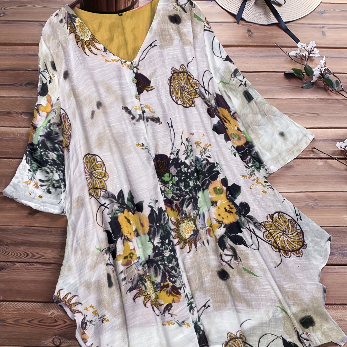 Women's Plus Size Casual Floral V-Neck Top with Short Sleeves and Asymmetrical Hem