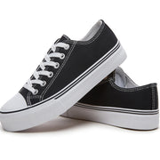 Women's Black and White Low Top Lace-Up Sneakers with Rubber Sole and Fabric Upper