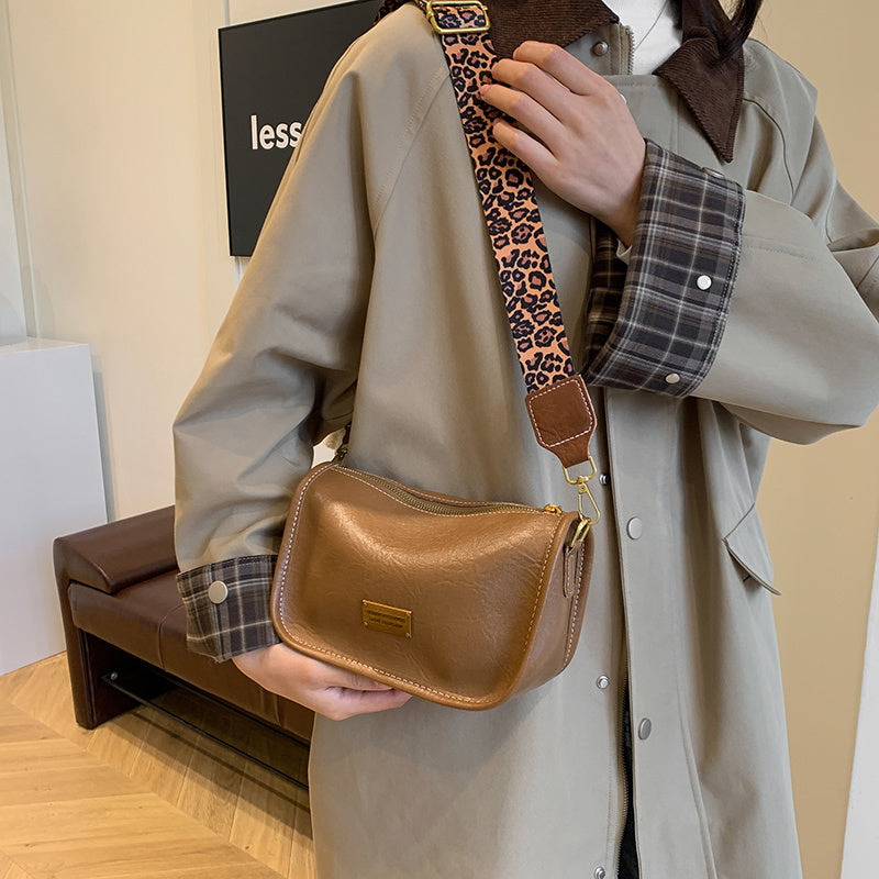 Women's Shoulder Bag with Adjustable Leopard Print Strap Zipper Closure Edge Paint Detail