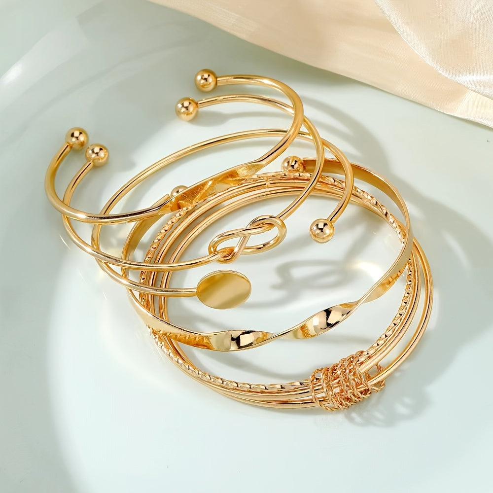 Set de 5 pulseras vintage abiertas para mujer, metálico dorado, con espiral geométrica y nudos