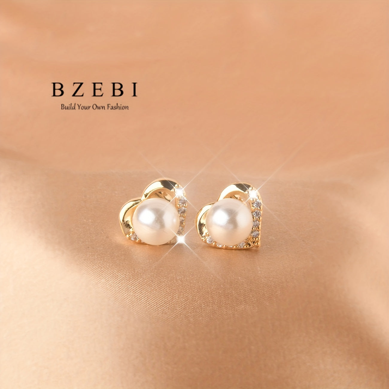 Set of Four Titanium and 18K Gold Plated Jewelry Pieces with Heart Design and Milky Stone