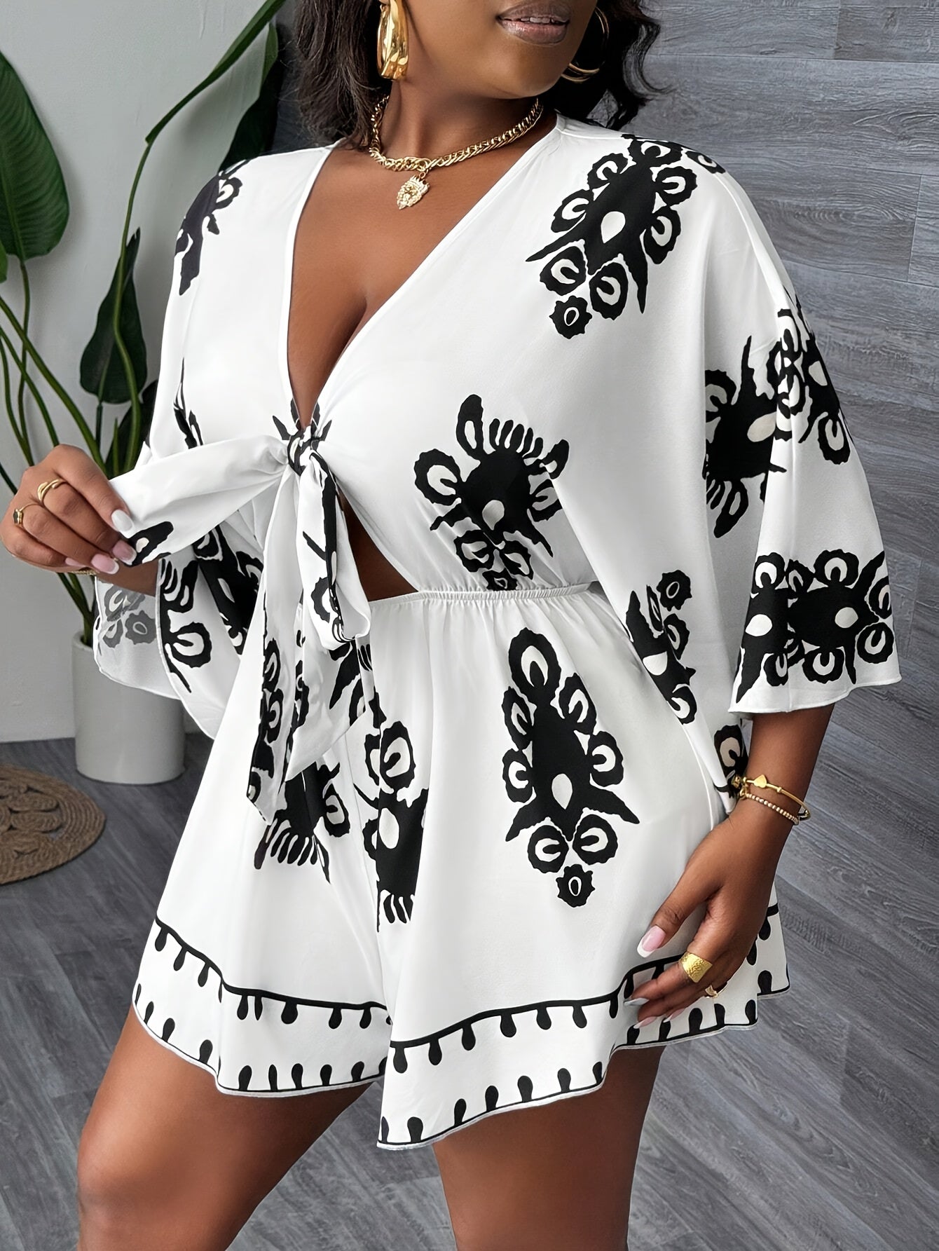 Plus Size Women's V-Neck Floral Romper with Tie Waist Black White Spring Summer
