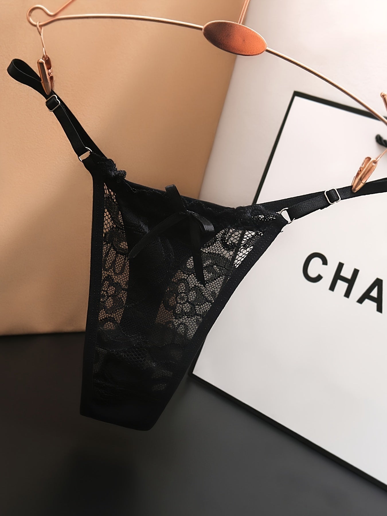 Black Lace Thong Panties with Adjustable Straps and Rose Gold Details for Women