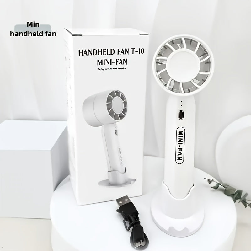 Portativ mini fan, USB bilan qayta zaryadlanadigan, 3 tezlik sozlamasi va asos standi bilan. Uy, ofis va ochiq sayohatlar uchun mos. Uchta rangda mavjud.