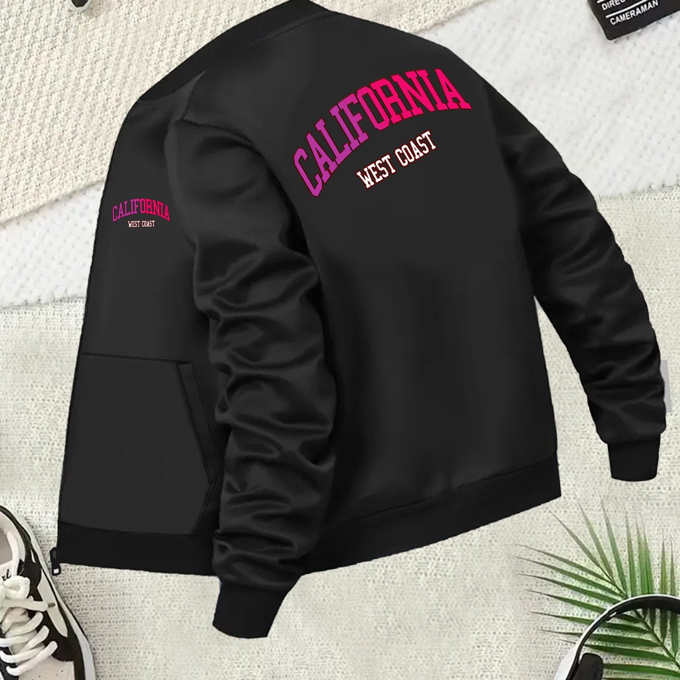 Women's Plus Size Black Pieced Bomber Jacket with Pink Lettering
