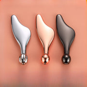 Metall yuz asboblari, jumladan, baliq boshini qirqish plitkasi, ko'z kremi to'p tayoqchasi, yuzni ko'tarish va siqish uchun kichik delfin metall qirqish plitkasi