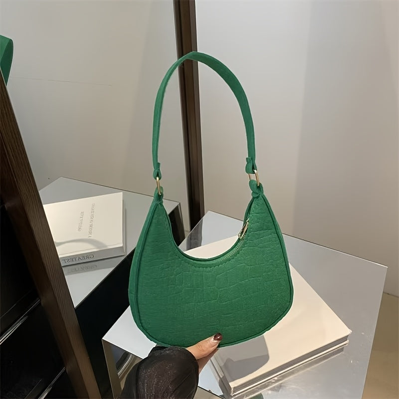 Zamonaviy ayollar uchun yelka sumkasi, clutch aksessuari, zipper yopilishi va o'rnatilgan tasma bilan, har qanday holat uchun ideal.