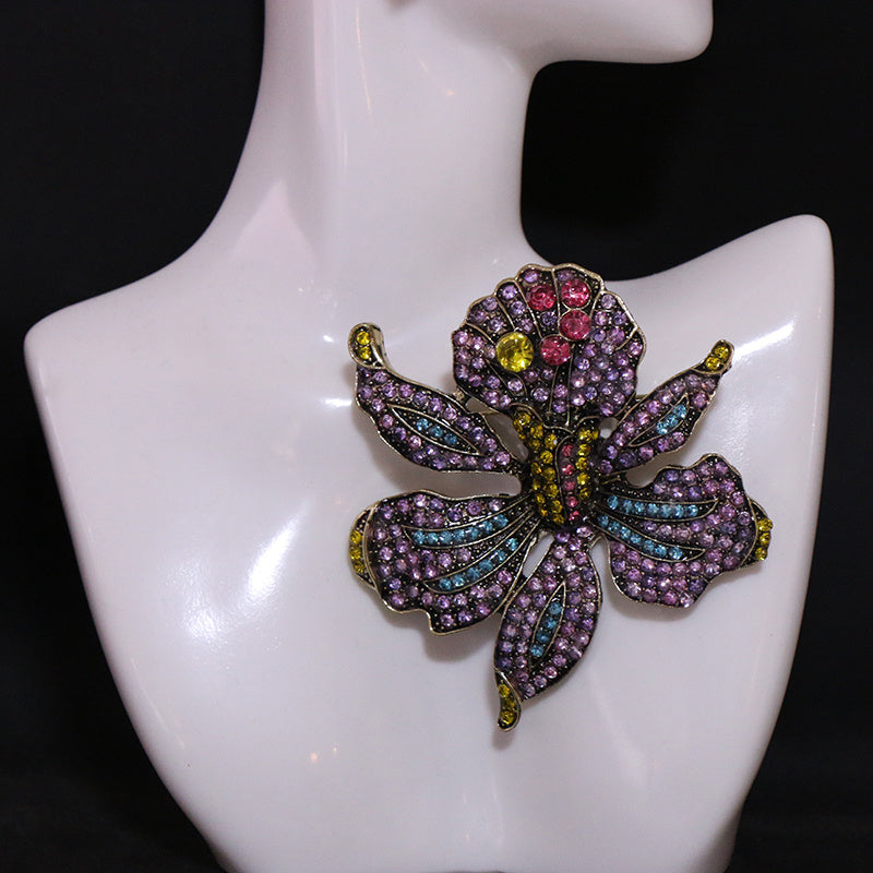 Women’s Gold Tone Baroque Flower Brooch with Rhinestones