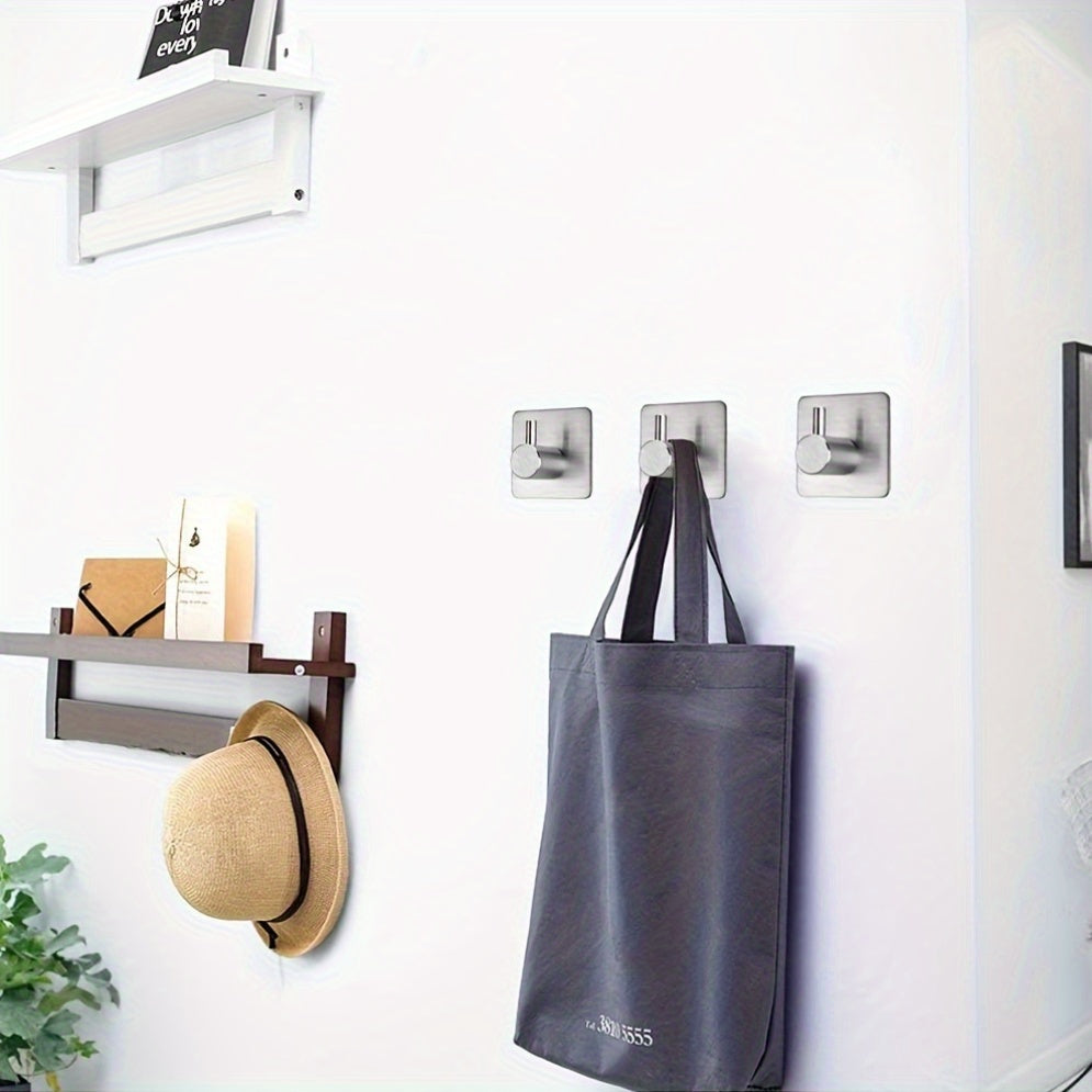 Four-Pack Stainless Steel Wall Hooks for Bathroom and Bedroom Organization Durable Polished Finish