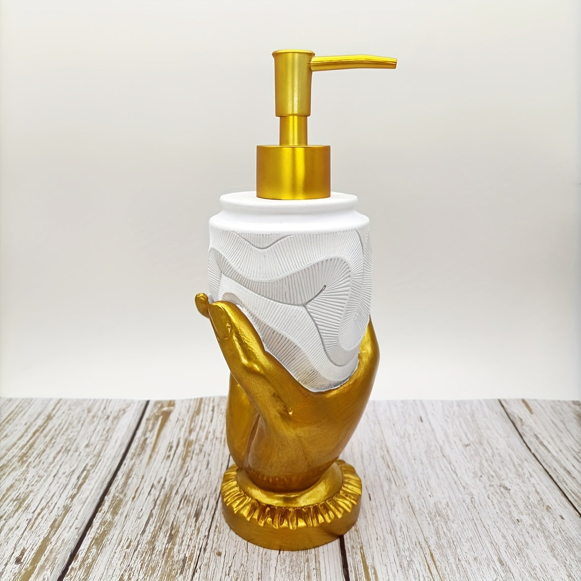 Dispensador de jabón de resina con huella dactilar en color dorado, diseño texturizado para baño y cocina