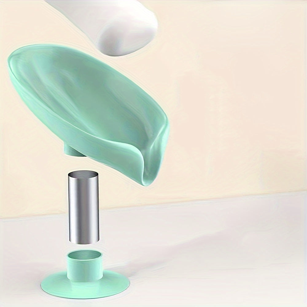 Yashil/xira rangda, kuchli so'rish va drenajga ega, elektr energiyasini talab qilmaydigan, hammom dekorini yaxshilaydigan, sabunni quruq saqlaydigan yaproq shaklidagi sabun idishi.