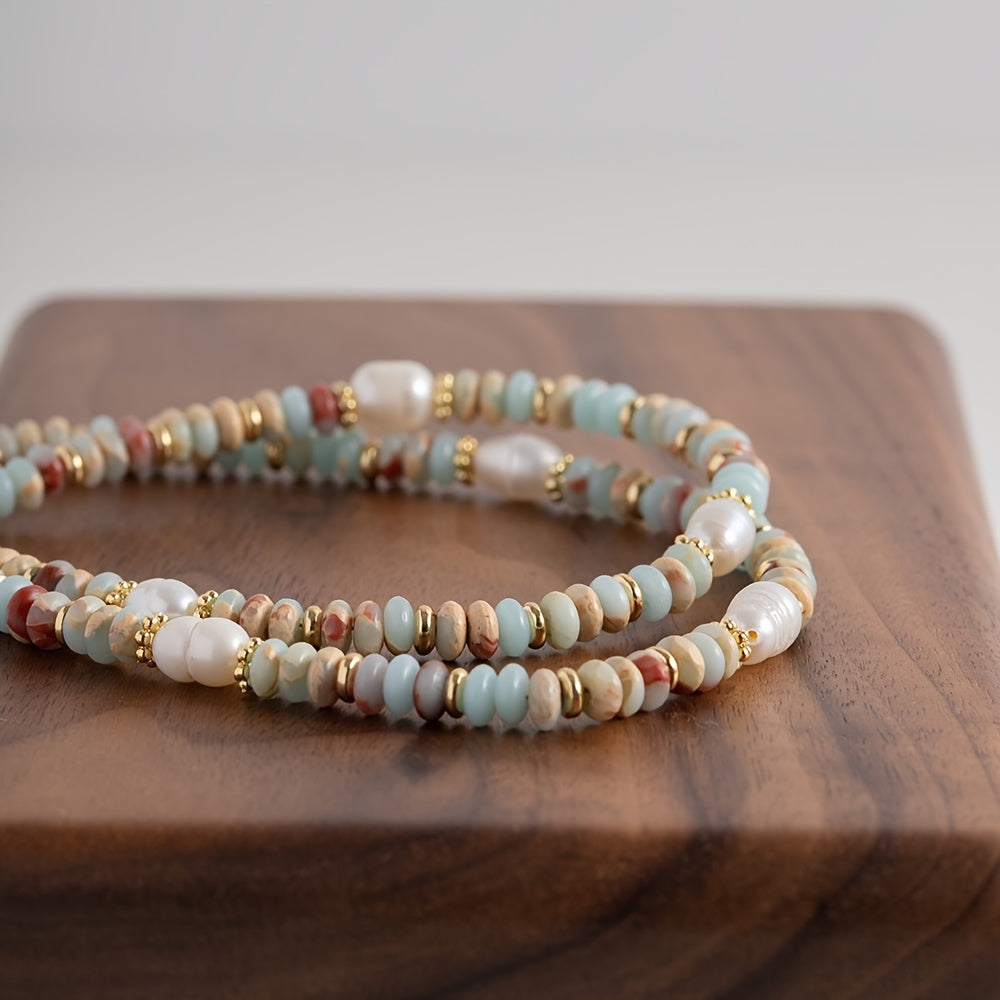 Vintage uslubidagi marjon, boho-chic shirin suv marvaridlari va tabiiy toshlar bilan bezatilgan, tasodifiy kiyimlar uchun yoki o'ylangan sovg'a variantlari sifatida ideal.