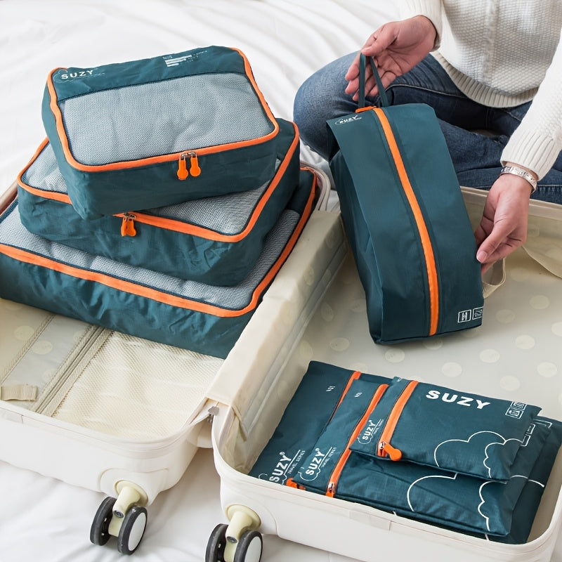 7-Piece Navy Blue Polyester Packing Cubes with Orange Accents for Travel Luggage Storage