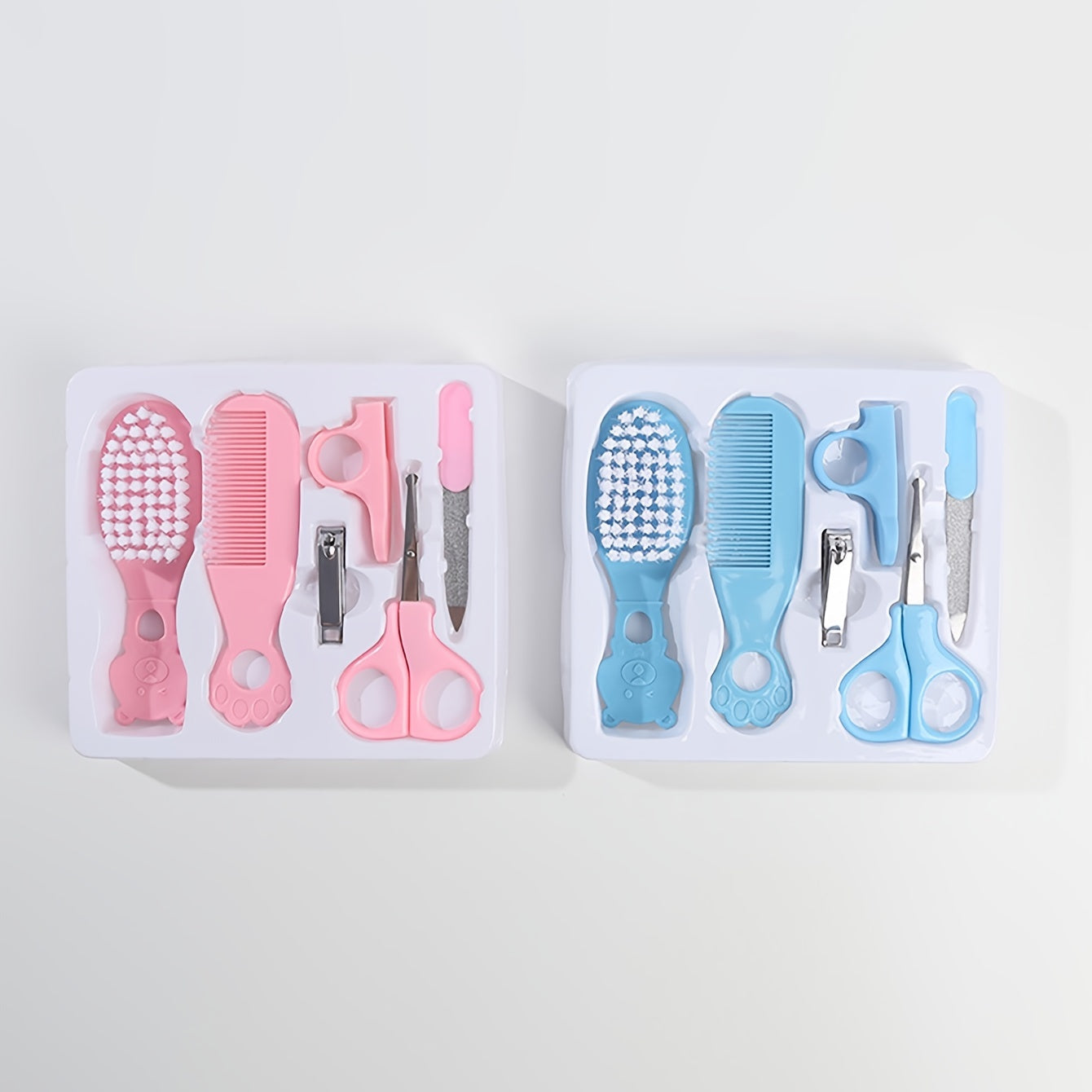 Juego de 6 artículos de cuidado para bebés en una caja con peine, cortaúñas, tijeras, lima de uñas y cepillo