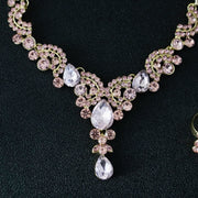 Ayollar uchun nozik 5 qismli zargarlik to'plami - Sink qotishmasidan va porloq rhinestone'lardan tayyorlangan, quloq bilaguzuklari, marjon, bilaguzuk va uzukni o'z ichiga oladi - To'y, ziyofat yoki banket kiyimlaringizga mukammal qo'shimcha