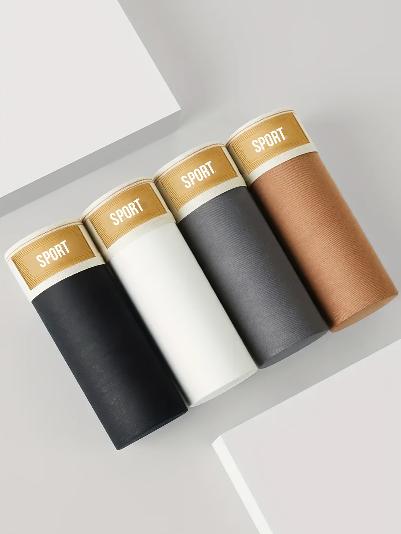 Erkaklar uchun nafas oladigan 3 ta polyester boxer short, sport va dam olish uchun o'rtacha cho'ziluvchan to'qima bilan.