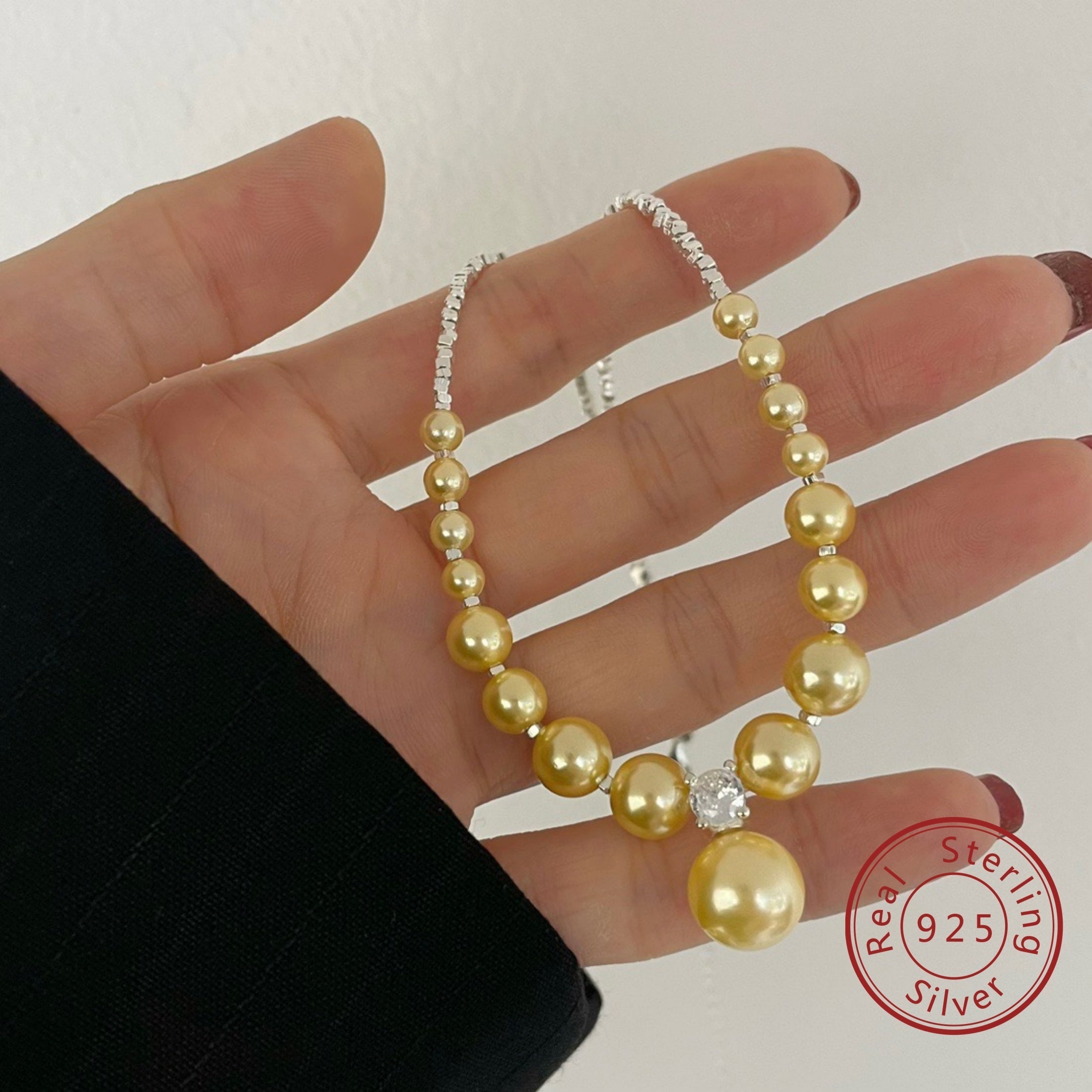 Qo'l bilan tayyorlangan original dizaynli marjon, zirkoniya qobig'i marjon va 925 sterling kumushda sozlanadigan zanjir, nafis vintage hashamatli sviter zanjiri. Sevimlilarga sovg'a berish uchun mukammal bo'lgan ko'p qirrali minimalist kundalik taqinchoq.