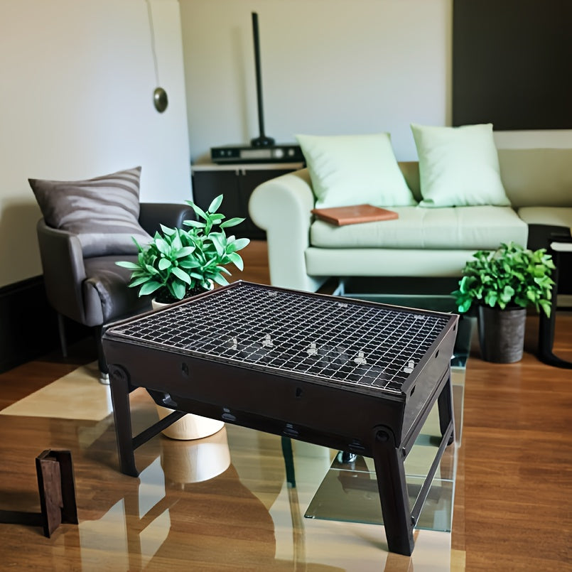 Tashqarida foydalanish uchun mustahkam oyoqlari va kul panasi bilan kichik va yengil rostlangan po'latdan yasalgan uglerod grill.