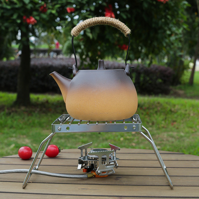 Sayohat va tashqarida ovqat pishirish uchun yig'iladigan oyoqlarga ega portativ zanglamaydigan po'latdan yasalgan gril