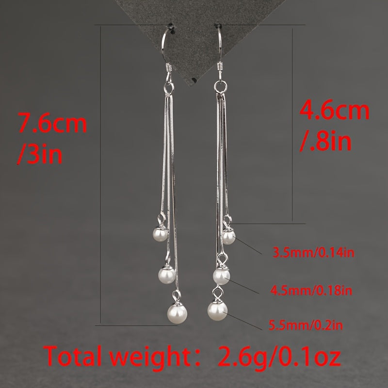 Silliq va zamonaviy, bu S925 Sterling Silver sirg'alar uzun tassellarga va shirin suv marvaridlariga ega. Gippoallergen va 2G og'irlikda yengil, ular ayollar uchun har kuni kiyish uchun ideal va ajoyib Onalar kuni sovg'asi bo'ladi.