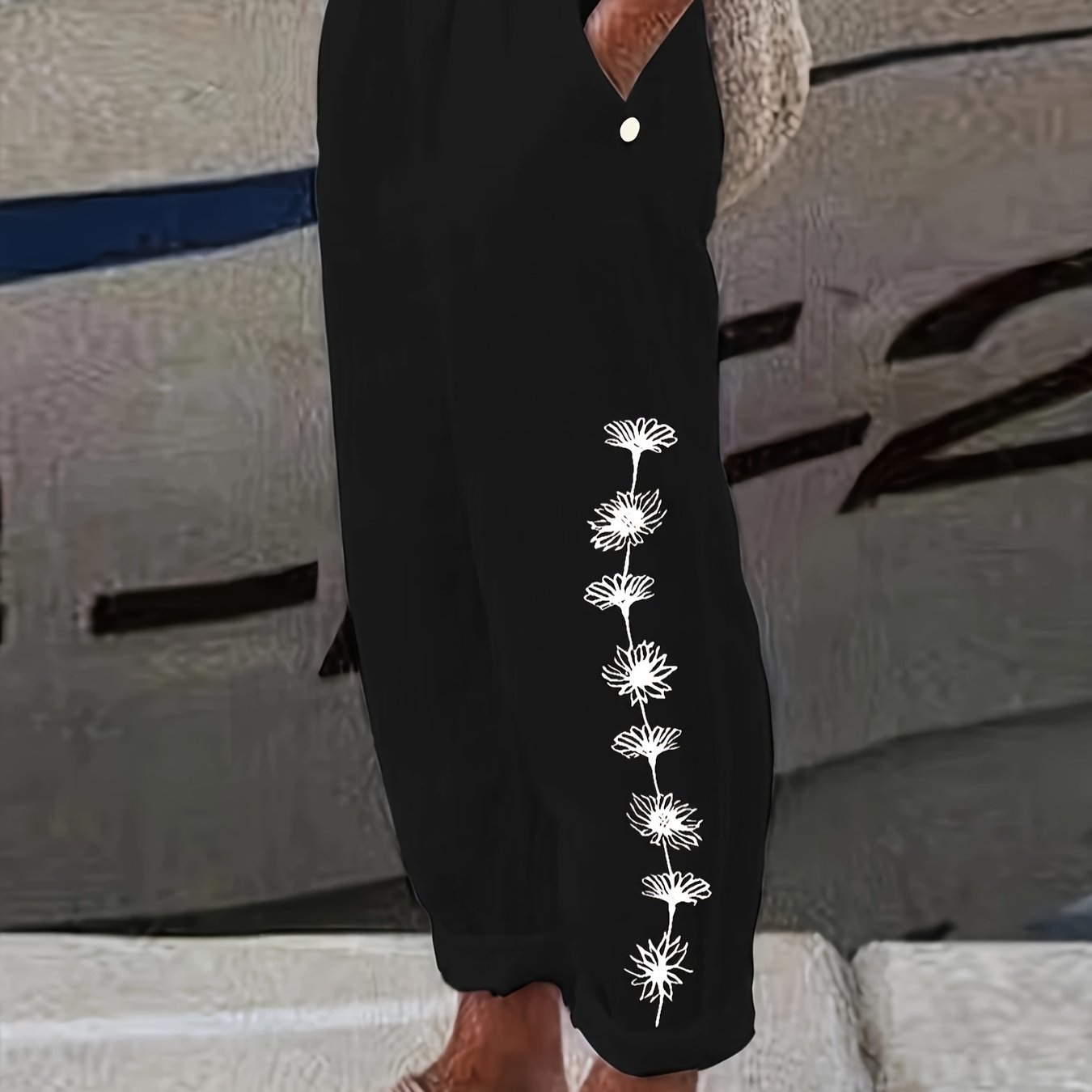 Pantalones harem de talla grande para mujer con estampado de diente de león en negro y bolsillos