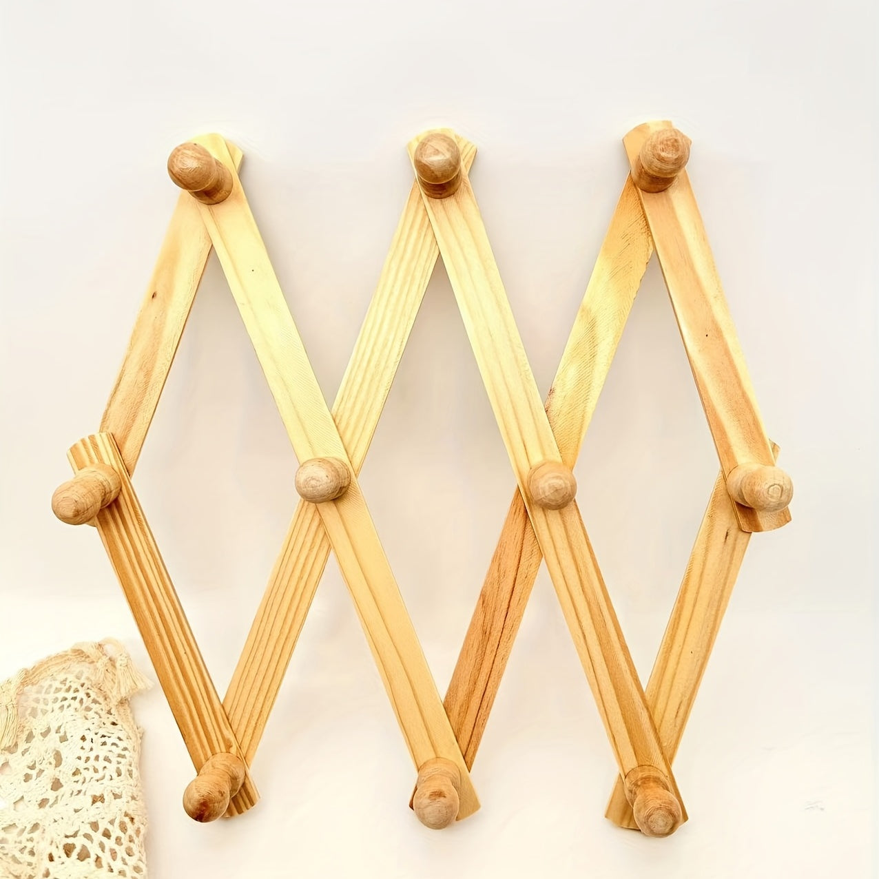 Gancho de pared retráctil de madera para bolsas, toallas, ropa y sombreros