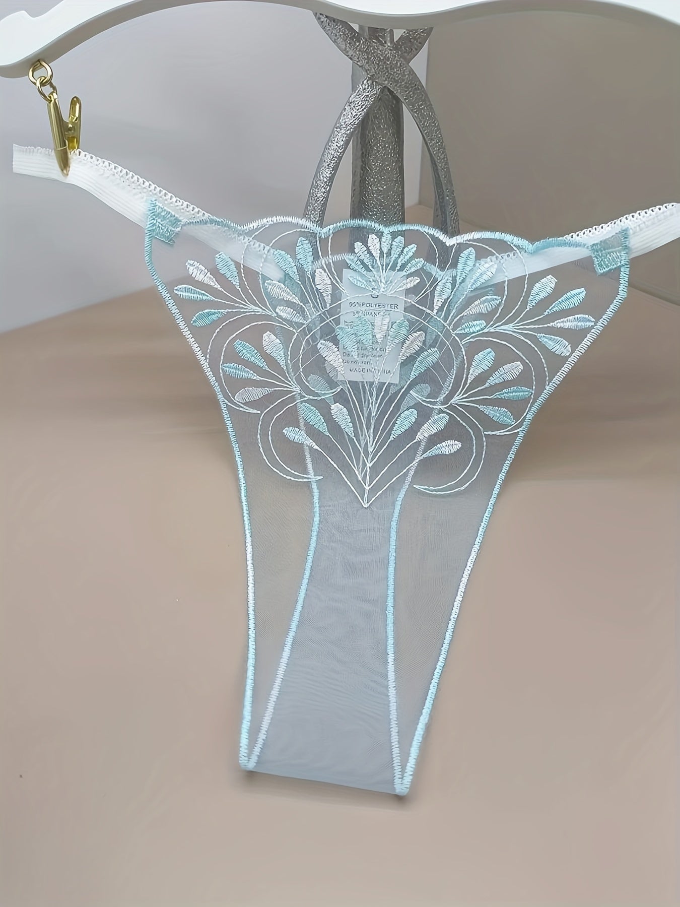 Women’s Blue Transparent Thong Panties with Net Embroidery and Pattern Design