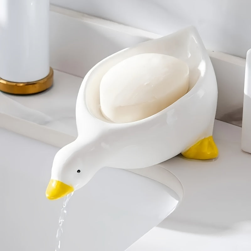 Dispensador de jabón en forma de pato para lavabo o ducha, a prueba de agua y con drenaje automático