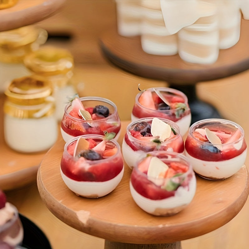 «Набор из 10 одноразовых круглых стаканчиков для десертов, 120 мл — идеально подходит для торта, йогурта, закусок, мороженого, мусса и многого другого. Изготовлены из ПЭТ-материала.