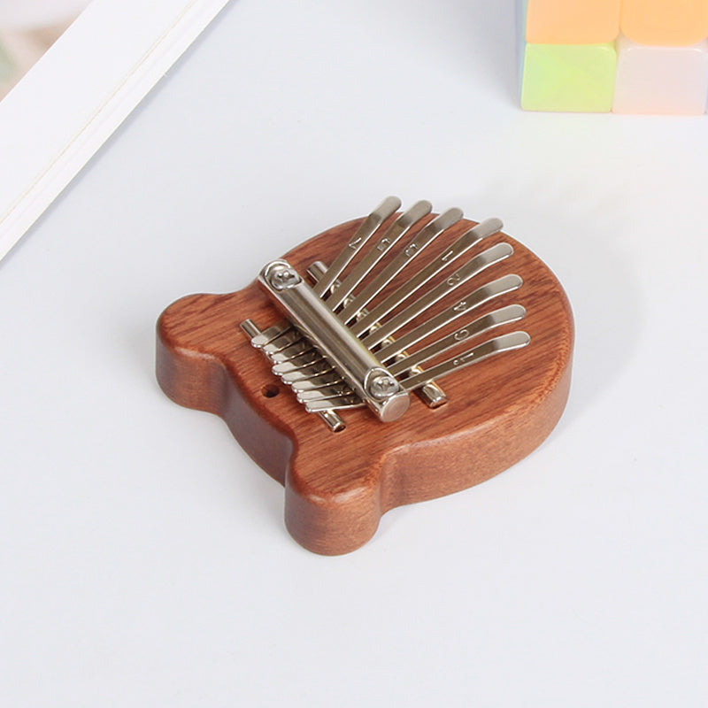 Mini Kalimba Thumb Piano for Beginners and Music Lovers Light Brown Wood 8 Keys Gift for Eid Al-Adha