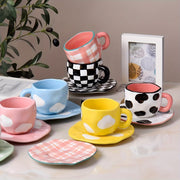 Handcrafted Ceramic Coffee Mug and Saucer Set with Whimsical Patterns Reusable and Recyclable