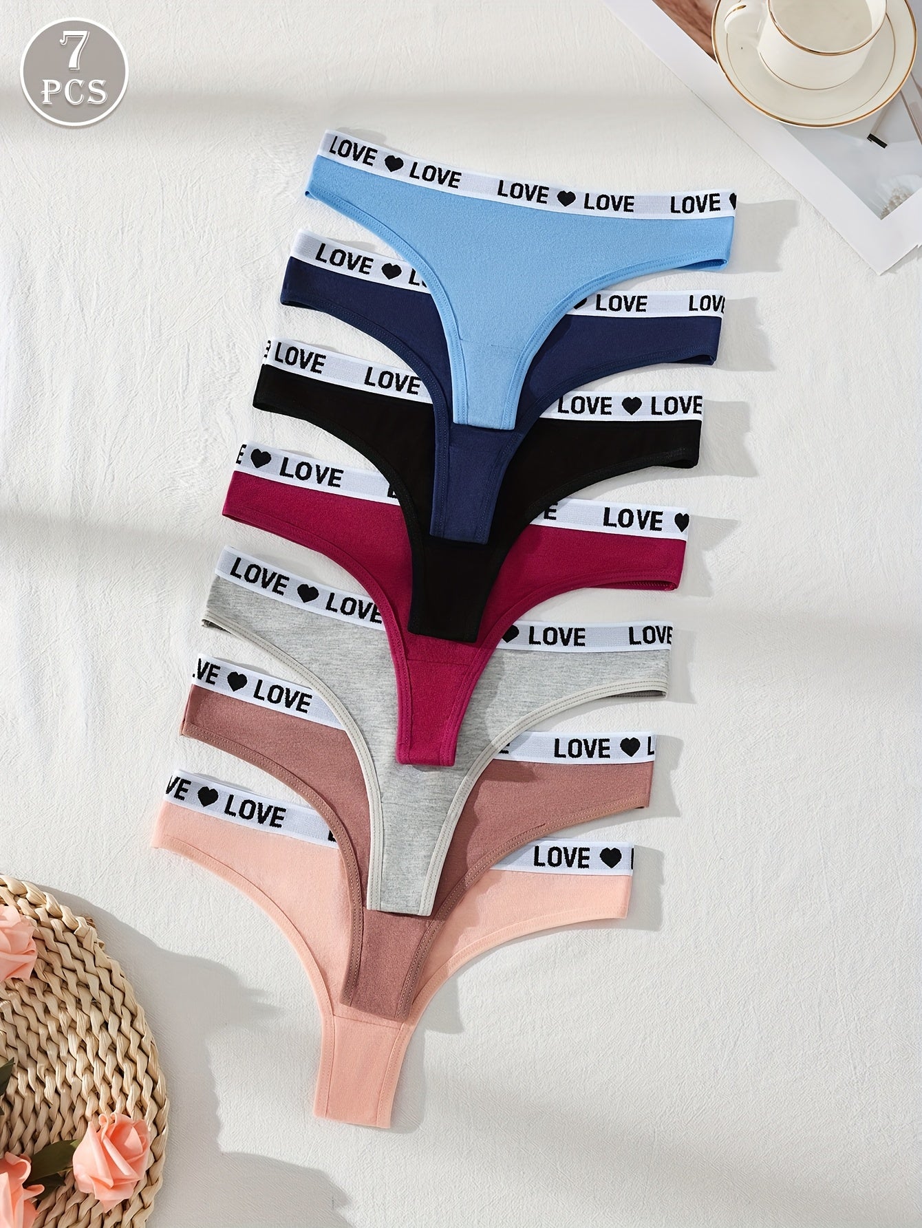 Women’s Solid Color Knit Fabric Thong Panties Set of 7 with Drop Waist and Elastane