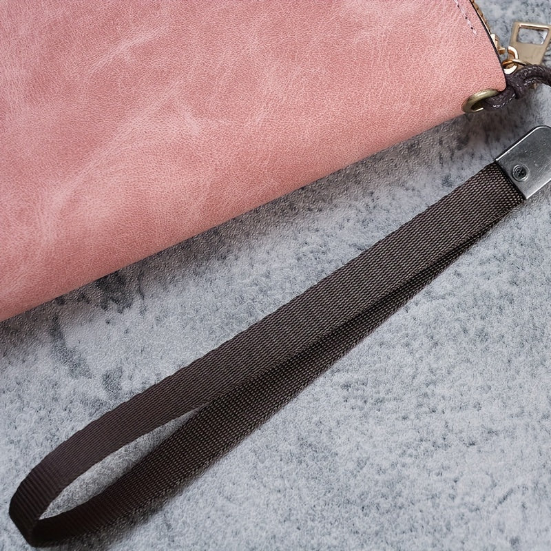 Cartera femenina de cuero sintético vegano negro con cierre de cremallera y correa de muñeca